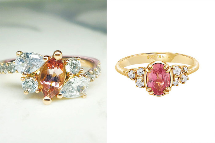close up of two rings with pink and orange stones