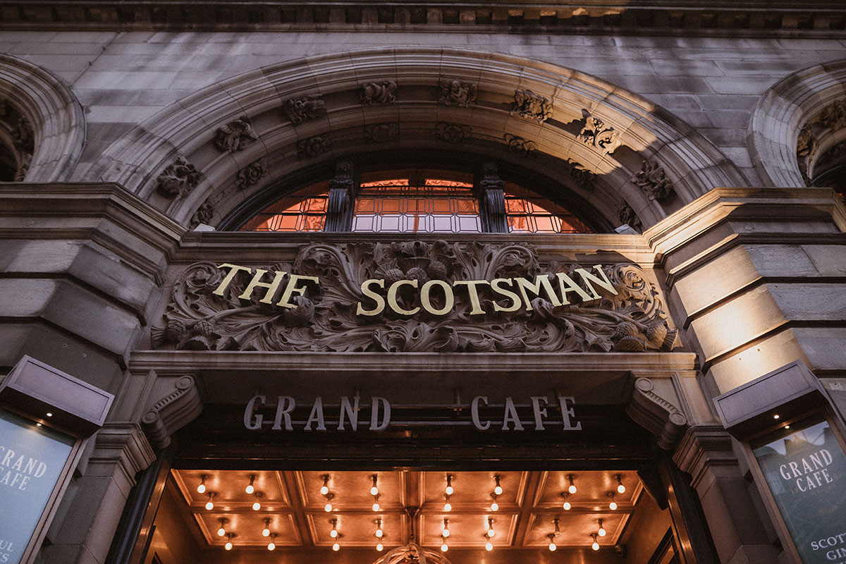 Exterior sign of The Scotsman Hotel in Edinburgh