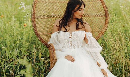Boho A-line wedding dress with off-the-shoulder sleeves by Stella York