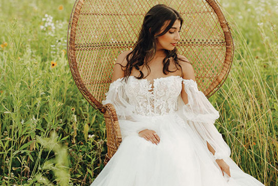 Boho A-line wedding dress with off-the-shoulder sleeves by Stella York