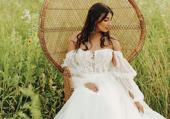 Boho A-line wedding dress with off-the-shoulder sleeves by Stella York