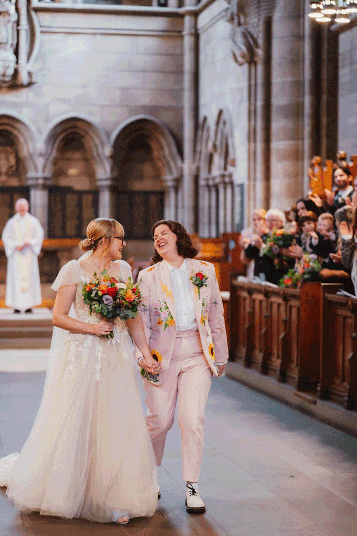 Couple walking together after wedding ceremony