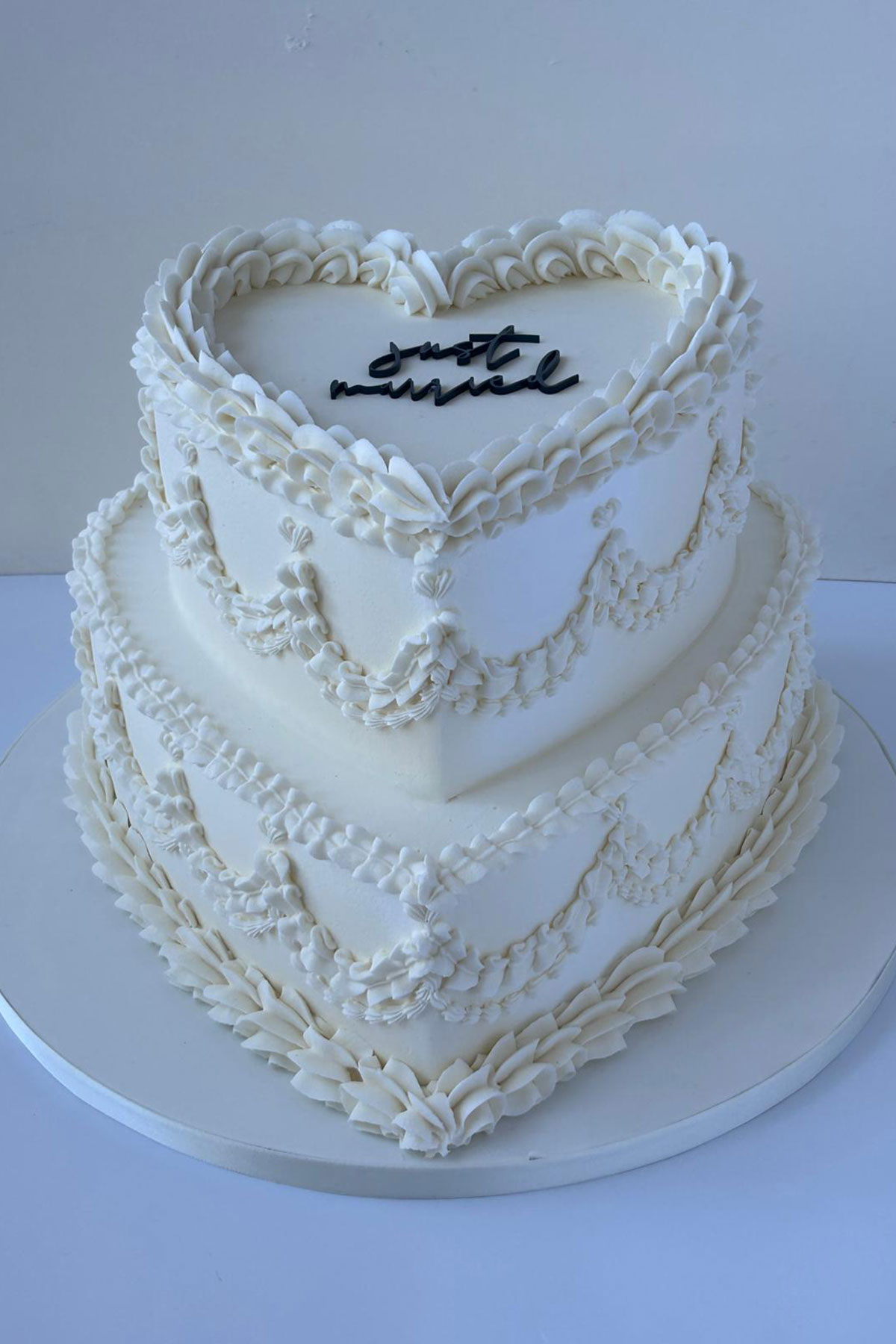 Heart-shaped piped wedding cake Liggy’s Cakes