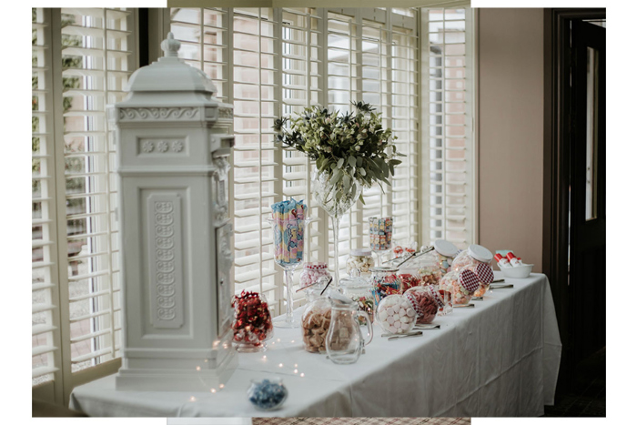 A White Wedding Postbox And Sweetie Table Set Up At Cornhill Castle
