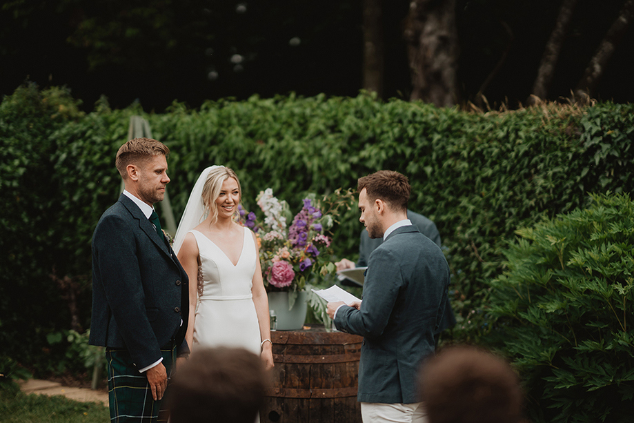 A Wedding Ceremony In The Rose Garden At Wedderlie House