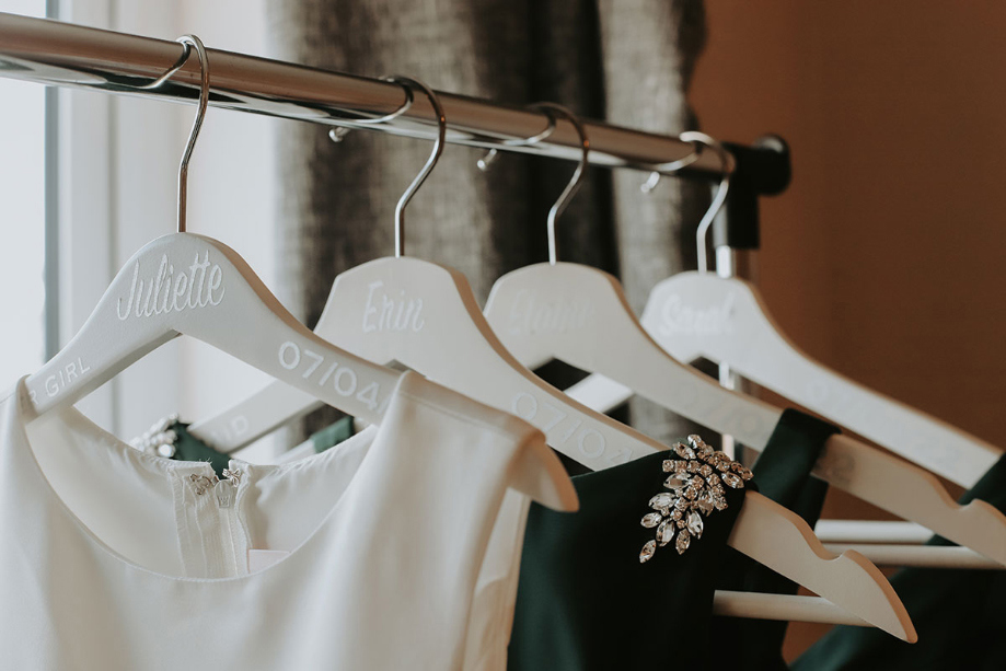 Dresses hanging on personalised hangers