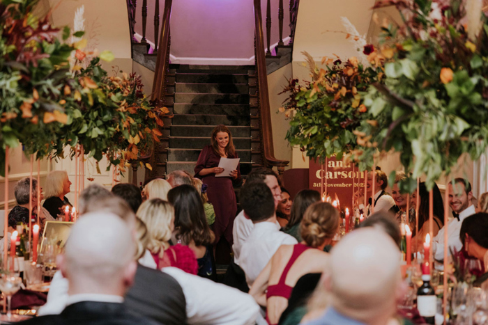 Bridesmaid Making Speech On Stairs At Netherbyres House