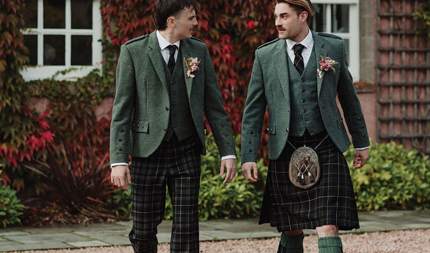 two men walking in McCalls tartan trews and kilt outfits