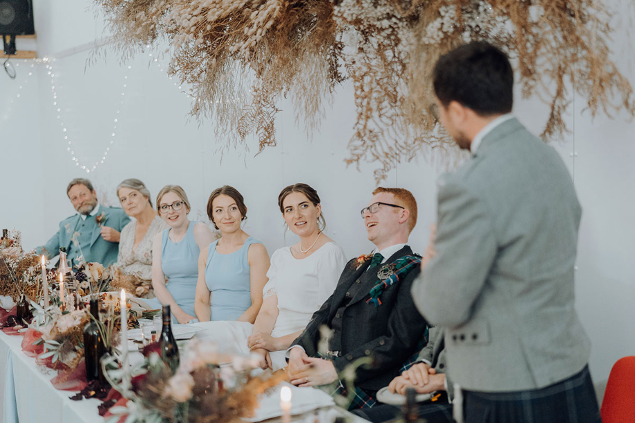 Groomsman gives speech during the wedding