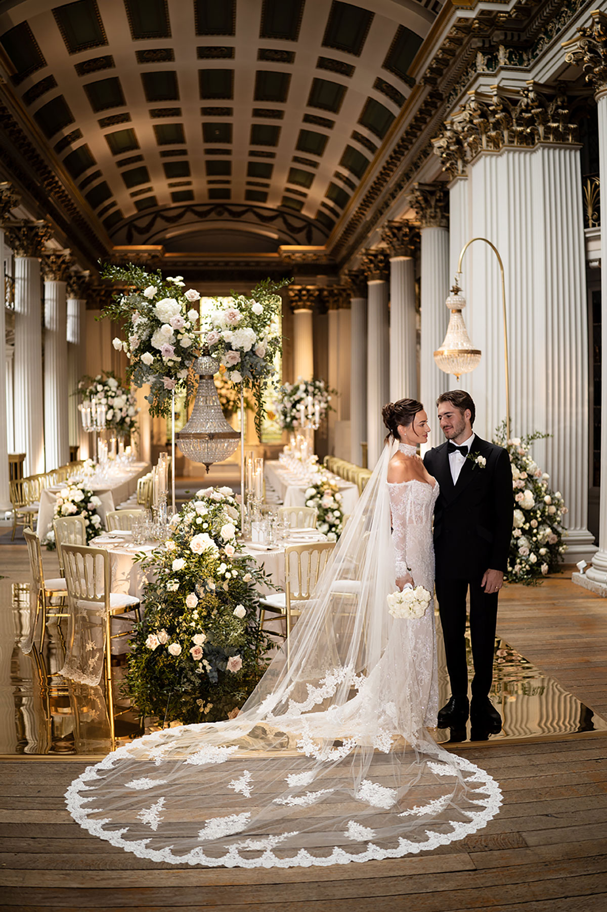 Bride and groom portrait in Signet Library reception room with long tables
