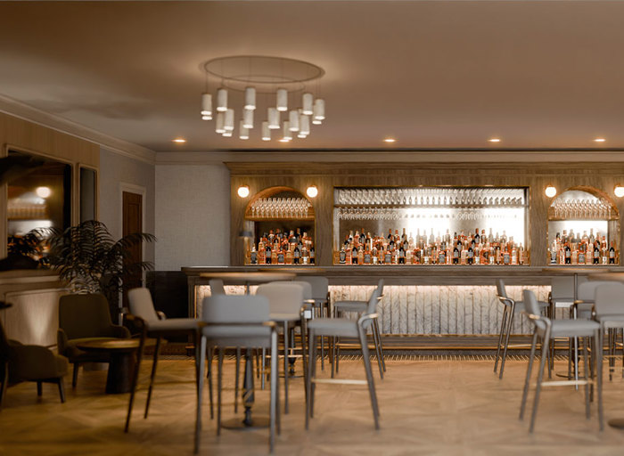 A bar with tall tables and tall grey chairs