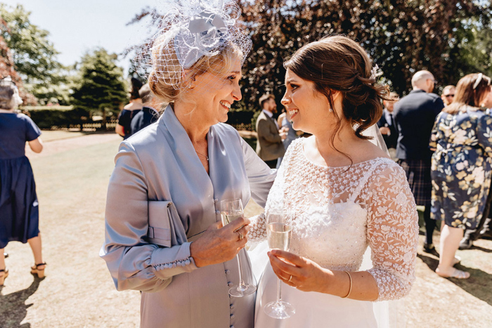 Bride With Mum Both Wearing Joyce Young Dresses