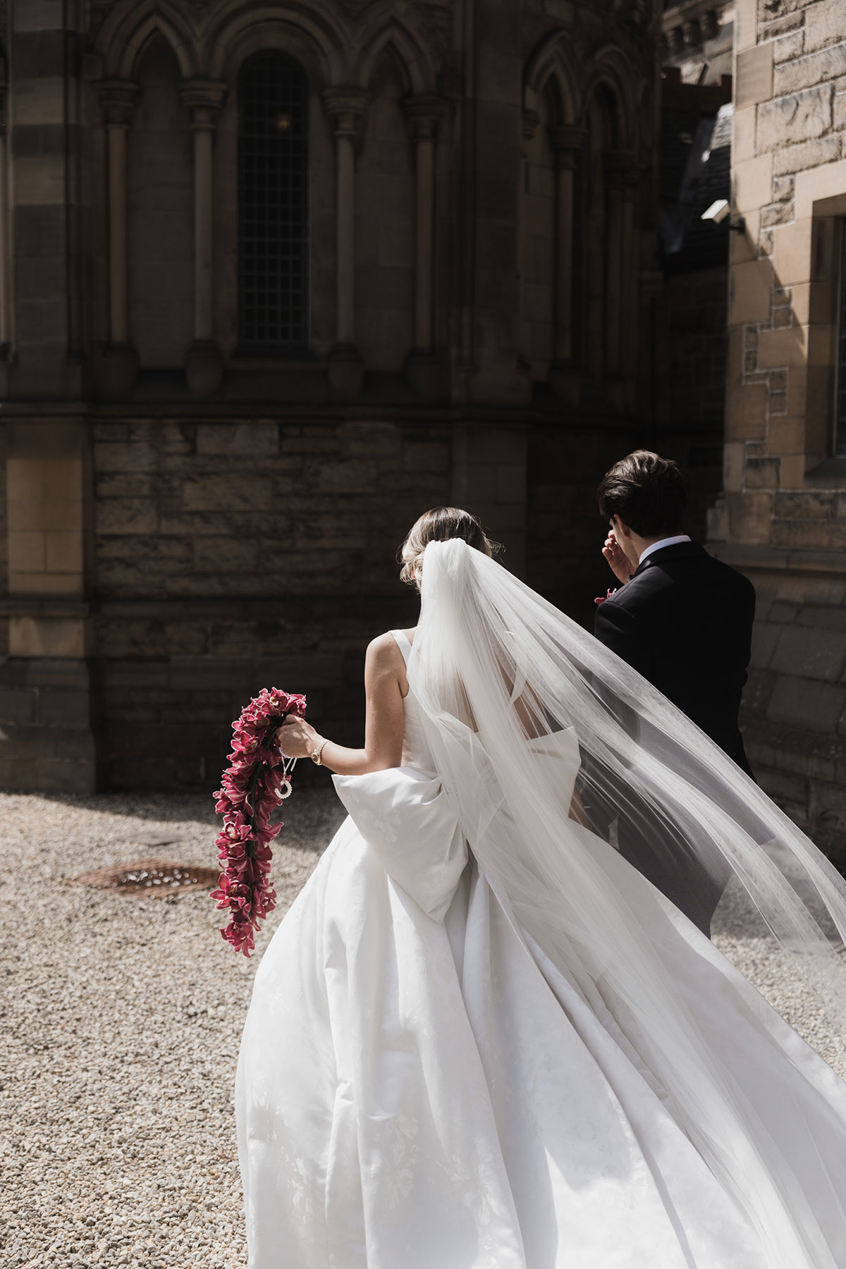 Bride and groom walking together outdoors after Mansfield Traquair wedding ceremony in Edinburgh