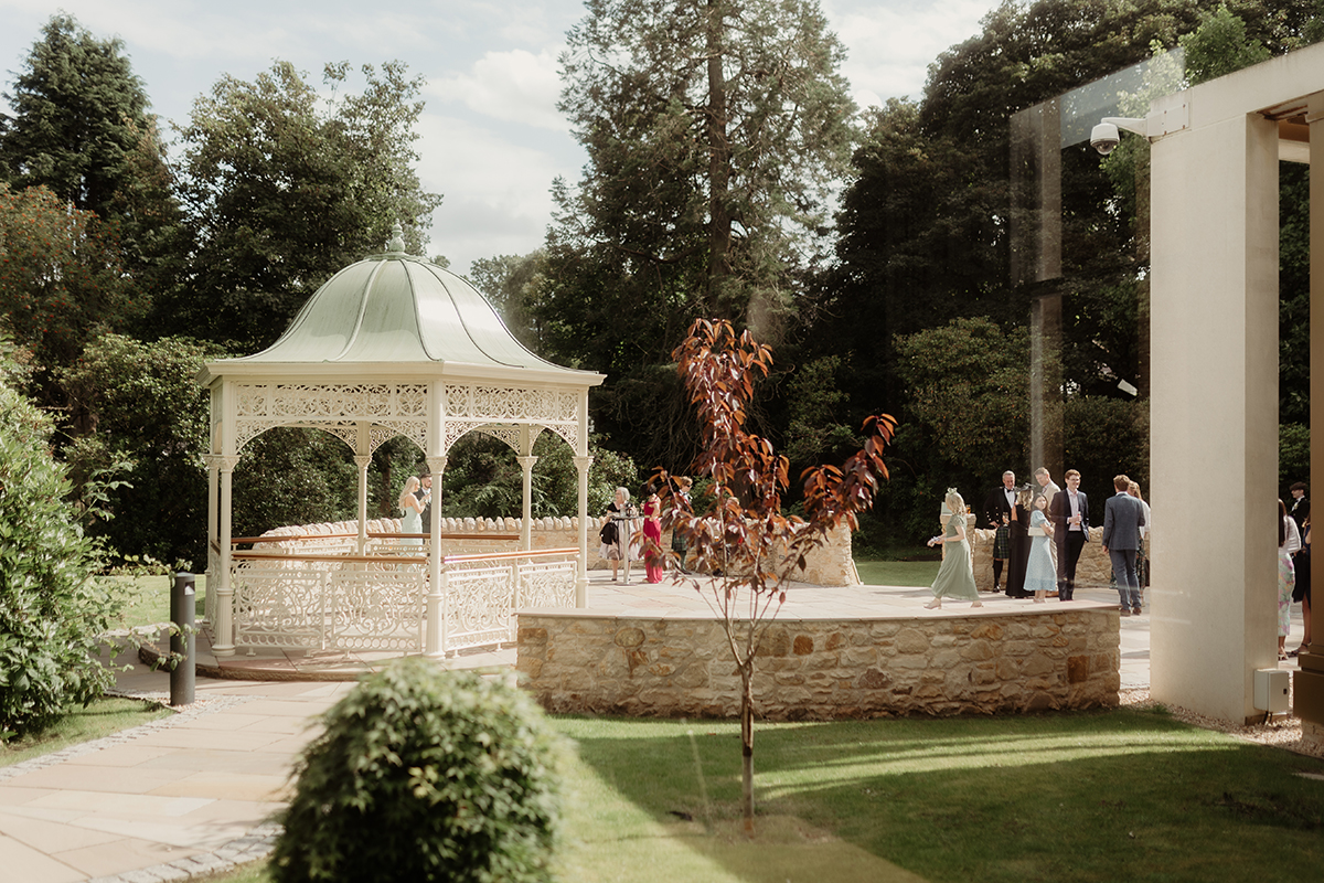 Outdoor wedding ceremony gazebo and landscaped gardens at Kilmardinny House wedding venue