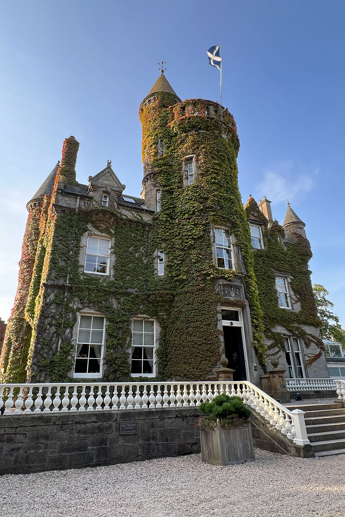 Ivy-covered exterior of Carlowrie Castle near Edinburgh, the wedding venue chosen by Laura and Darren.