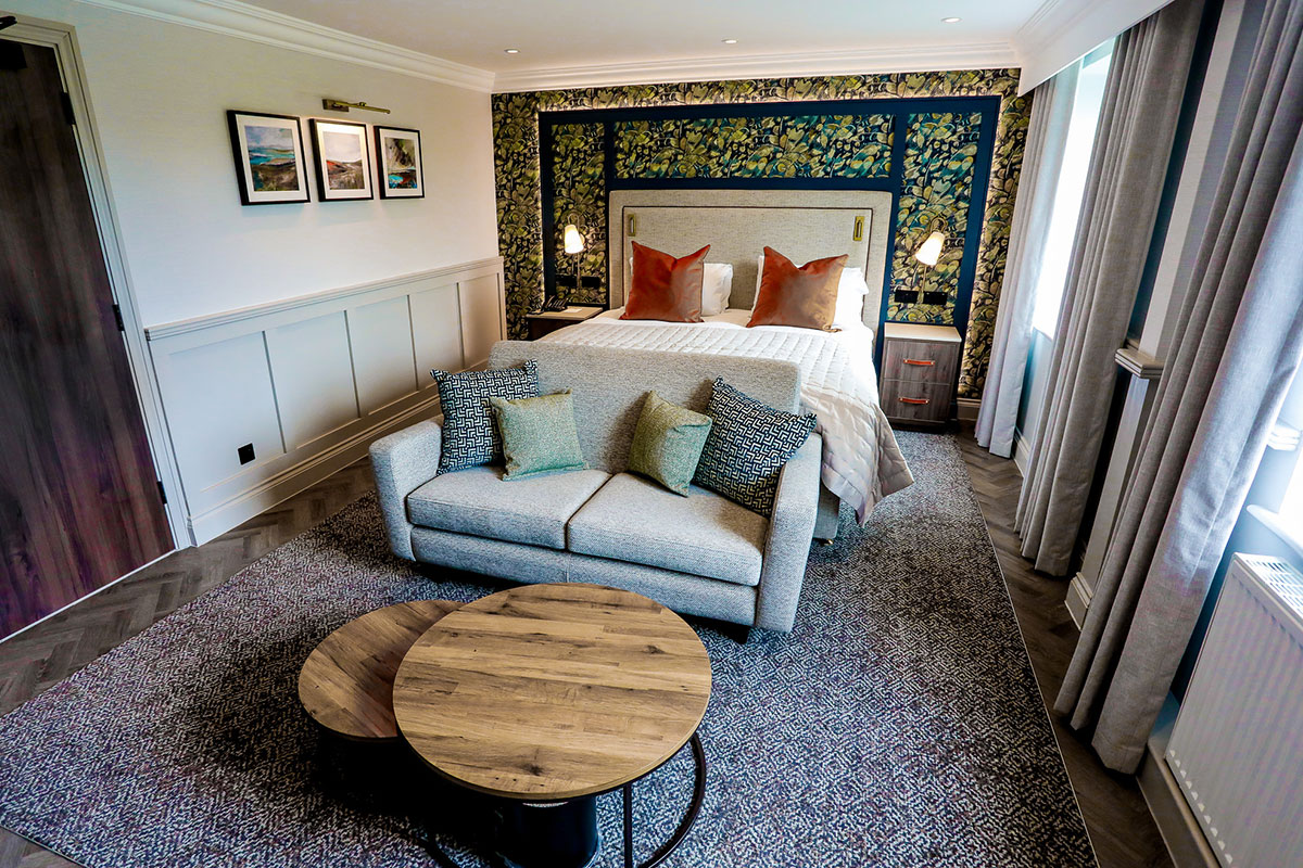Luxury Signature Suite bedroom at Gretna Hall Hotel, offering elegant accommodation for couples marrying at Gretna Green.