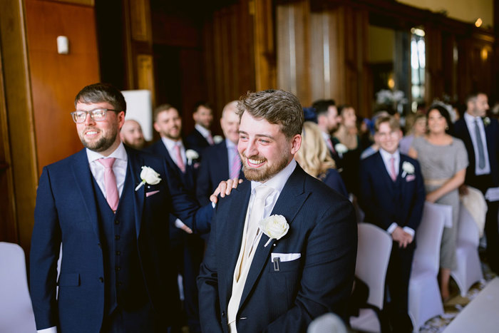 a group of men in suits.