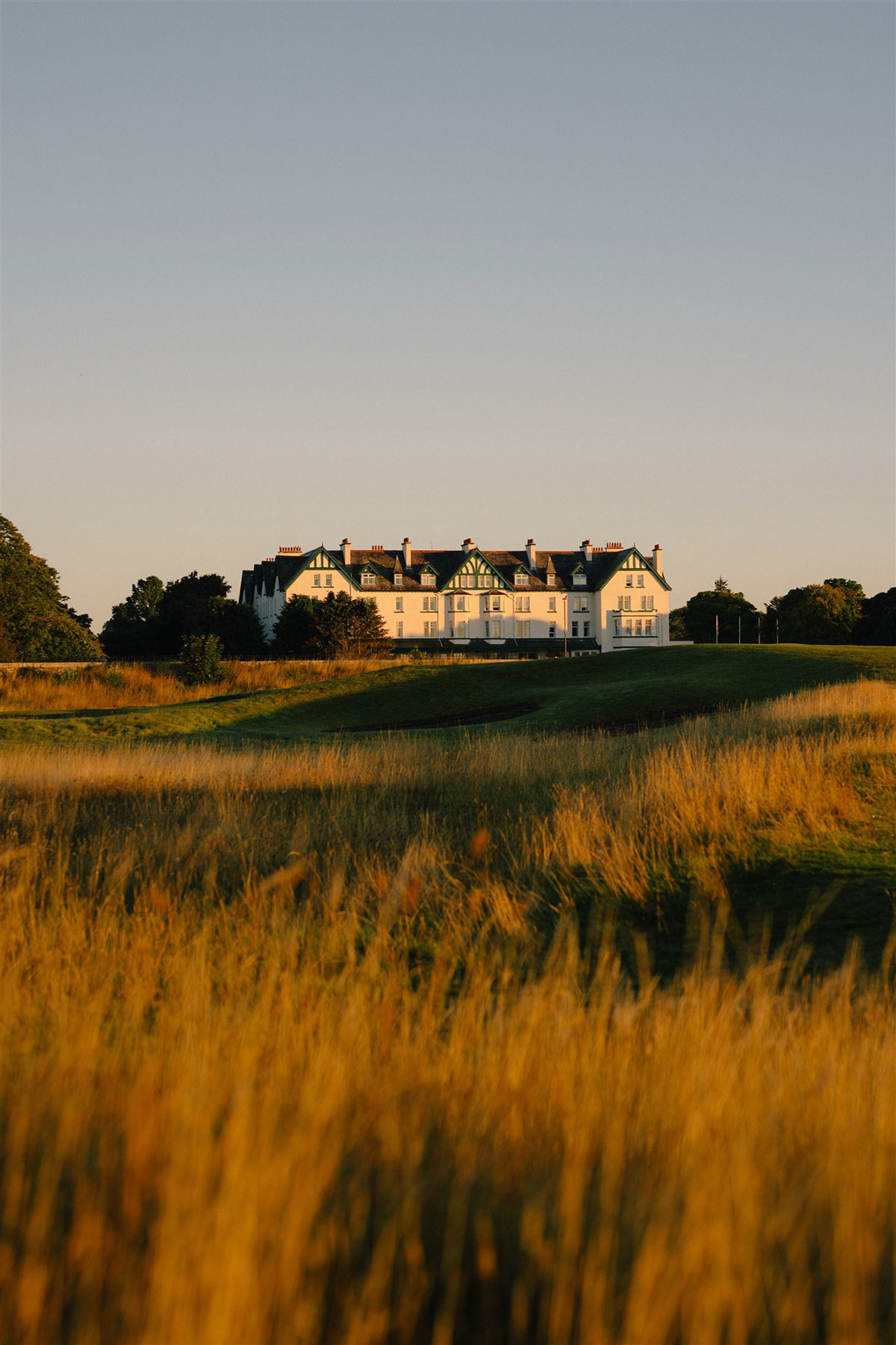 Dornoch Station hotel exterior at sunset, a coastal wedding venue in the Scottish Highlands