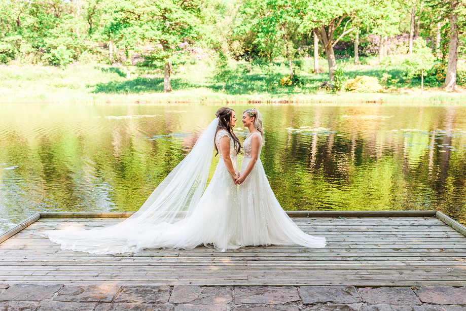 Couple portraits in front of water
