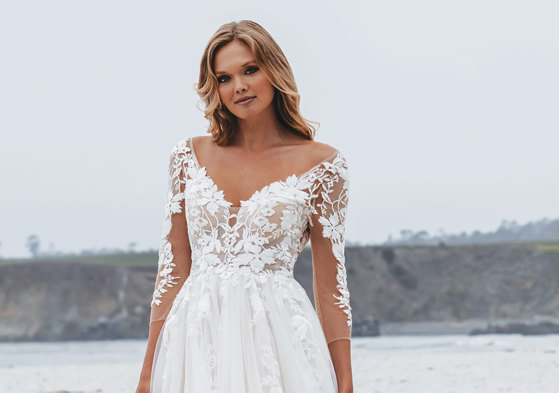 floral applique wedding dress on a blonde bridal model