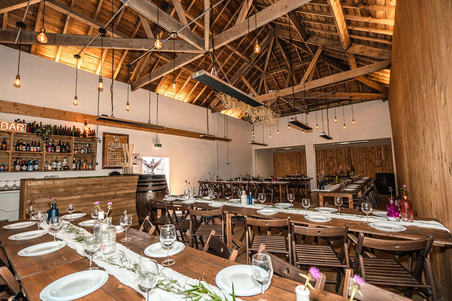 The hay barn at Folkerton Mill set for a wedding dinner