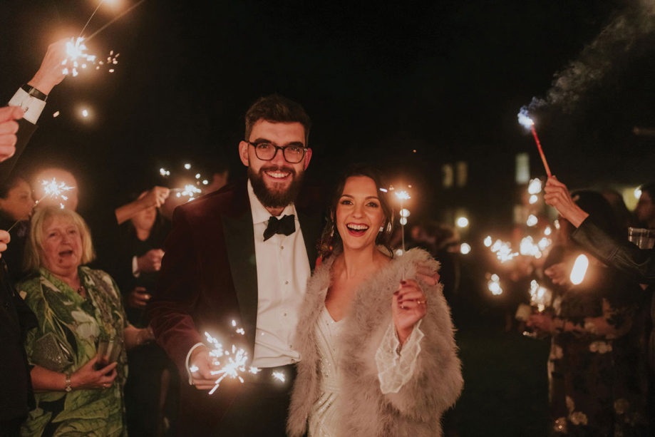 Bride And Groom With Sparklers At Bonfire Night Wedding At Netherbyres House