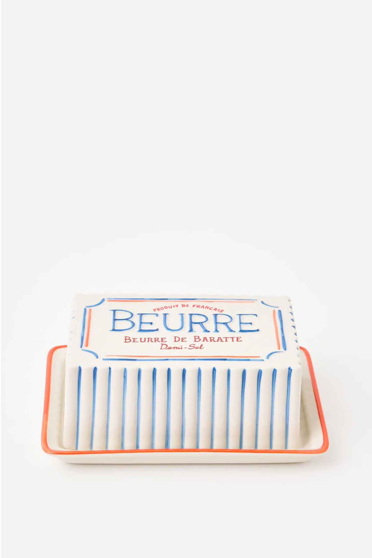 Oliver Bonas ceramic beurre butter dish with blue and red detailing, a stylish kitchen wedding gift idea for food-loving couples