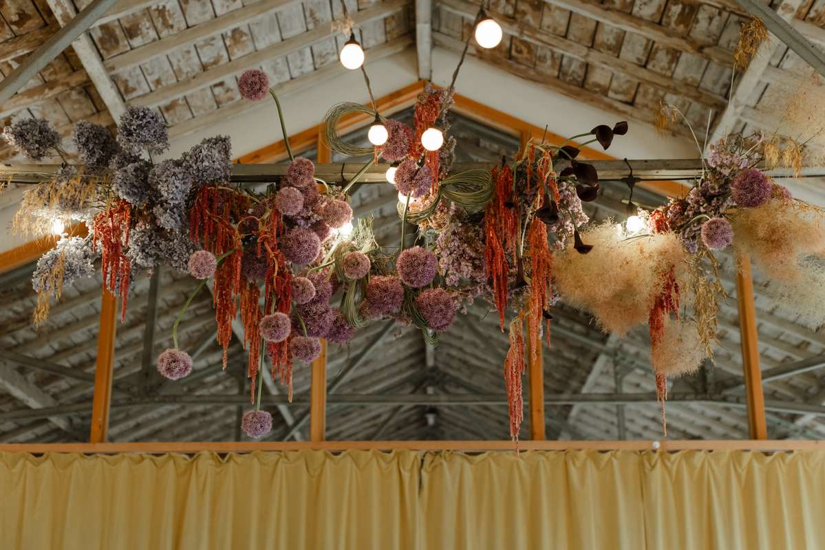 Colourful hanging floral installation at a Civic House Glasgow wedding