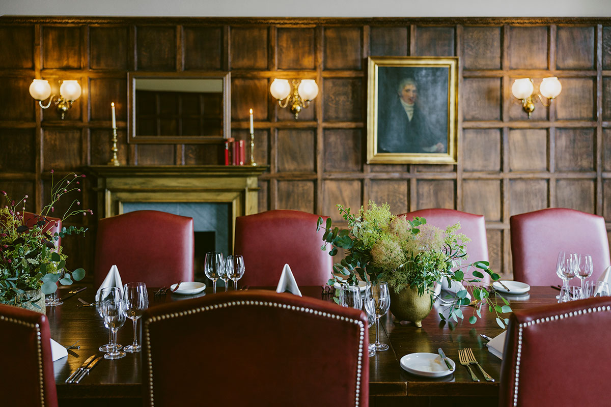 Intimate wedding dining table set up at Marine North Berwick with wood-panelled interiors