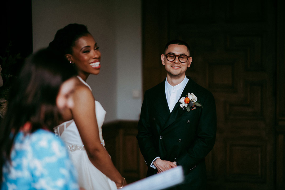 Couple laugh during the wedding ceremony