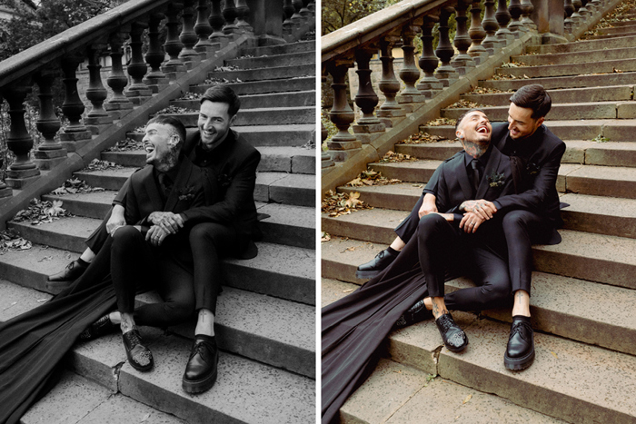 Two Grooms Wearing Black Embracing On Set Of Stairs