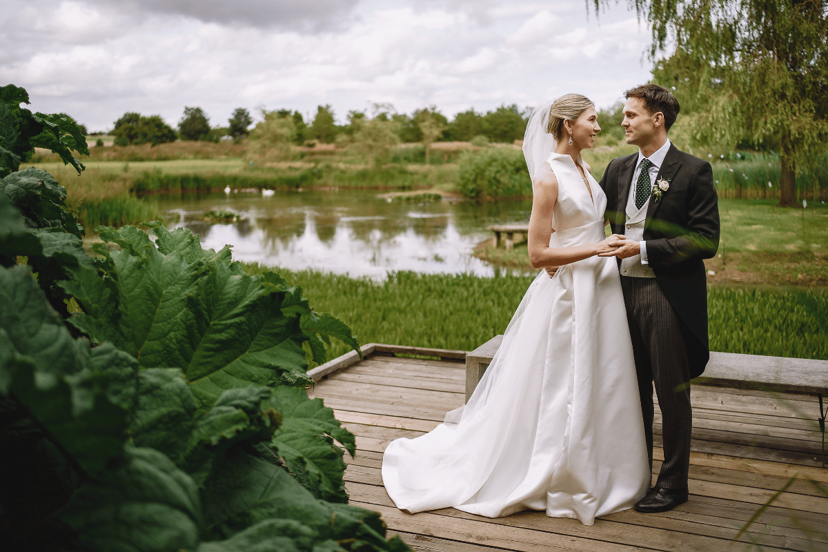 A newly married couple standing outsite at Jupiter Artland in Edinburgh
