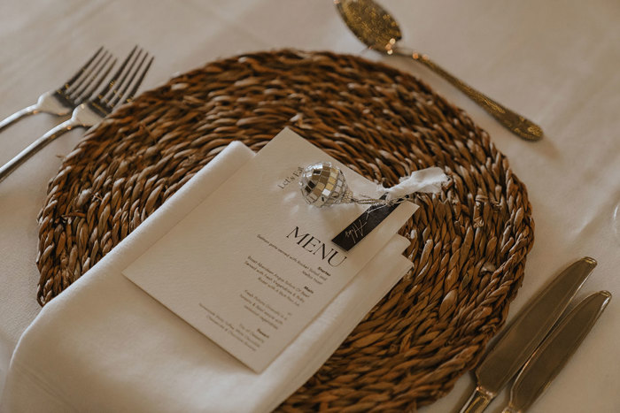 place setting with napkin and menu at falside mill wedding