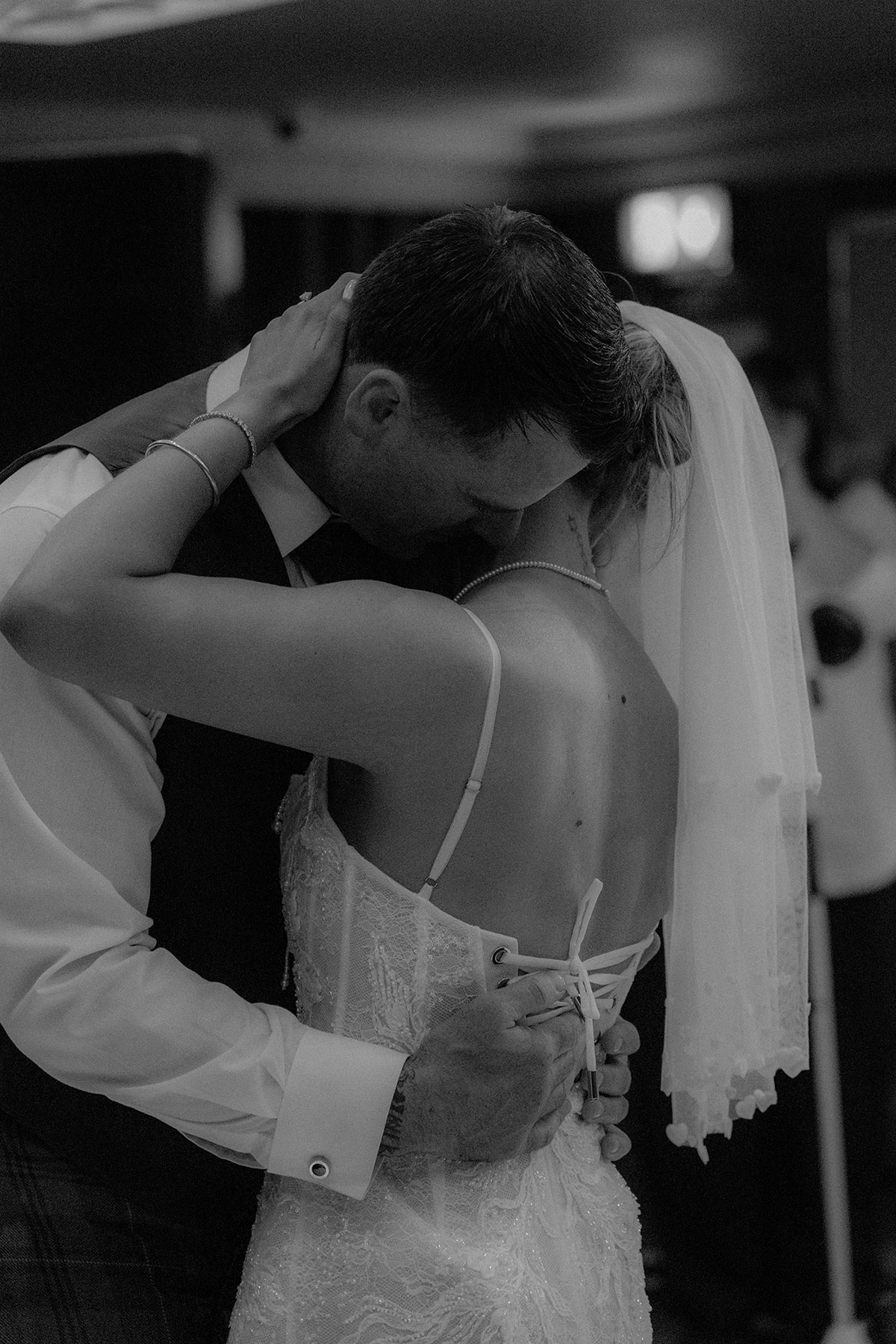 Bride and groom sharing emotional first dance at Brisbane House Hotel wedding reception