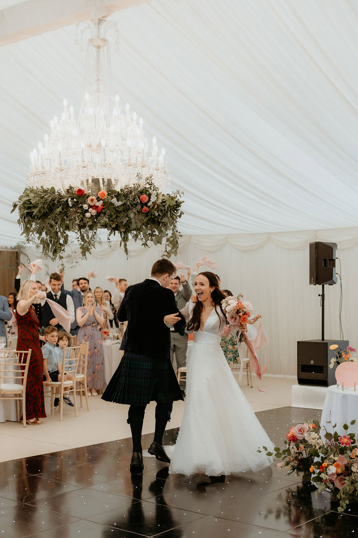 a bride and groom dancing at wedding reception at Carlowrie Castle