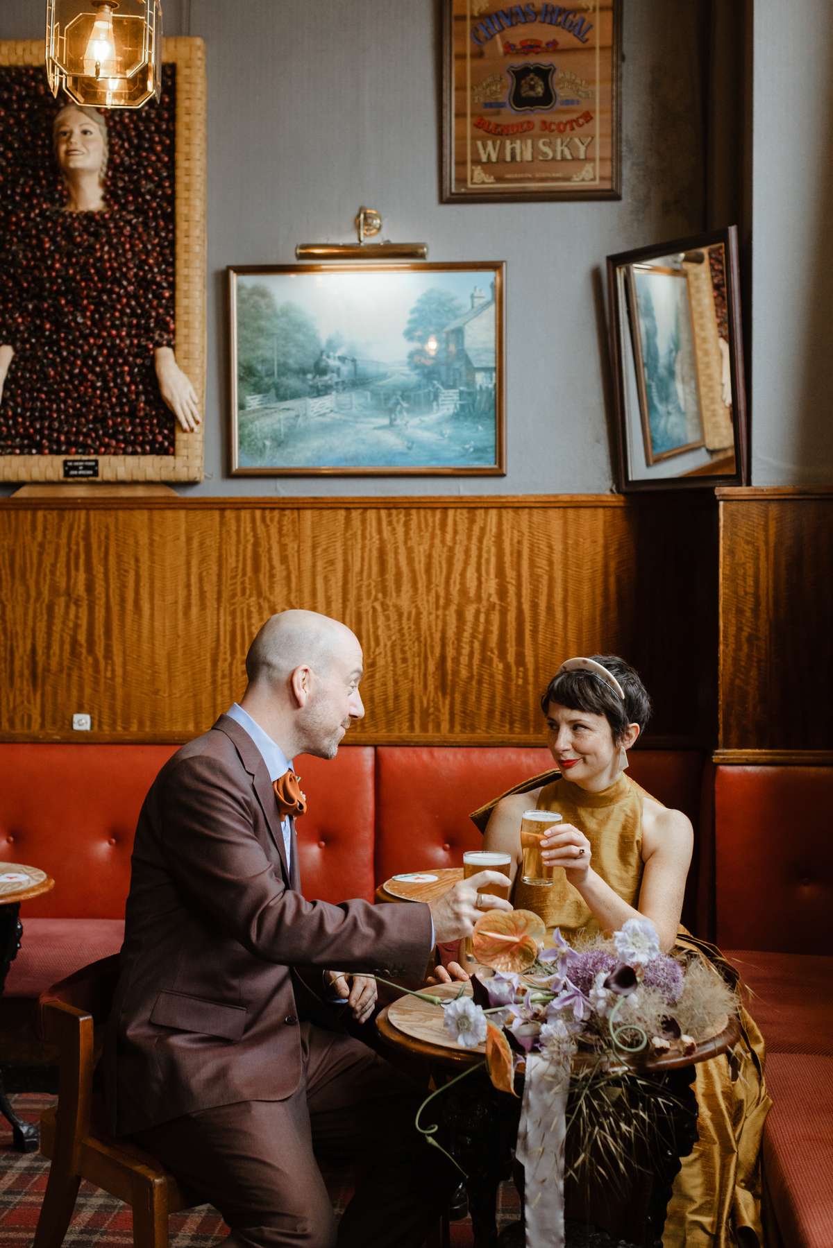 Colourful Glasgow wedding styling with a gold bridal dress and statement flowers