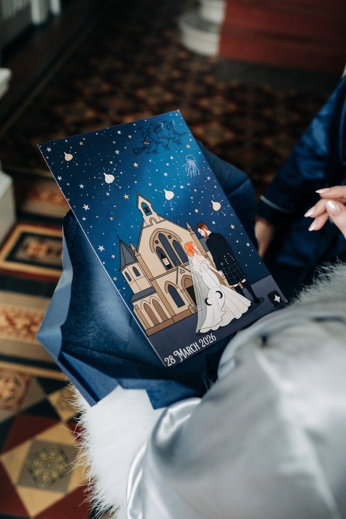 Bespoke illustrated wedding stationery featuring Òran Mór, a starry night sky and the wedding date for Robyn and James’s Glasgow wedding.