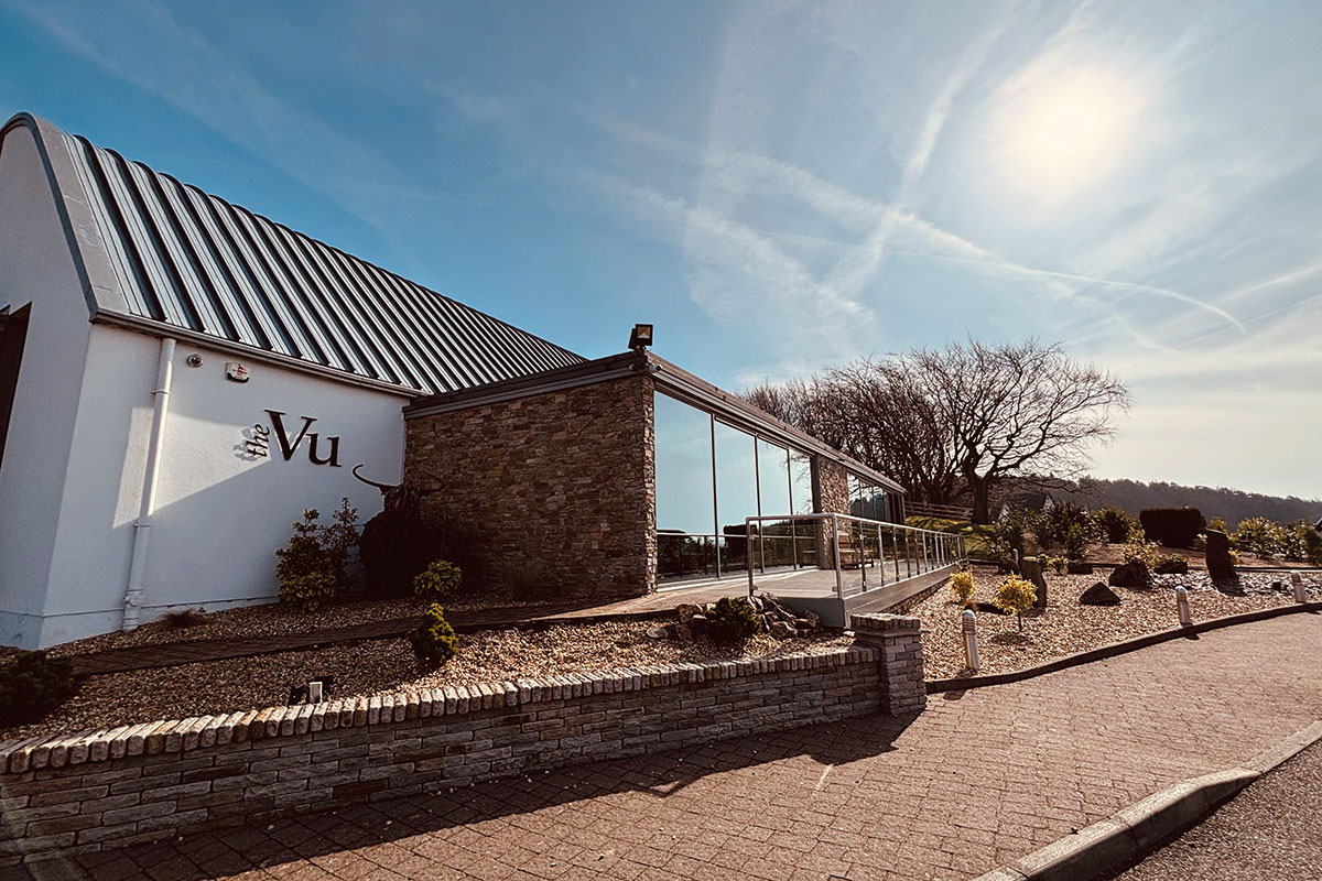 Exterior of the Oasis wedding suite at The Vu in Bathgate, with glass-fronted entrance and landscaped grounds