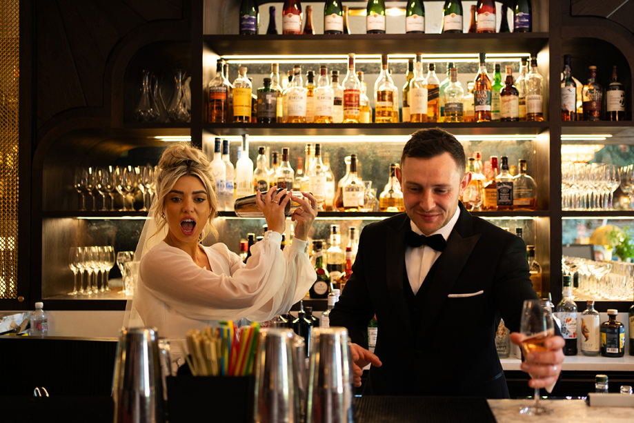 Bride And Groom Shaking Cocktails