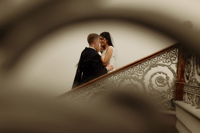 bride and groom in focus at kilmardinny house in bearsden