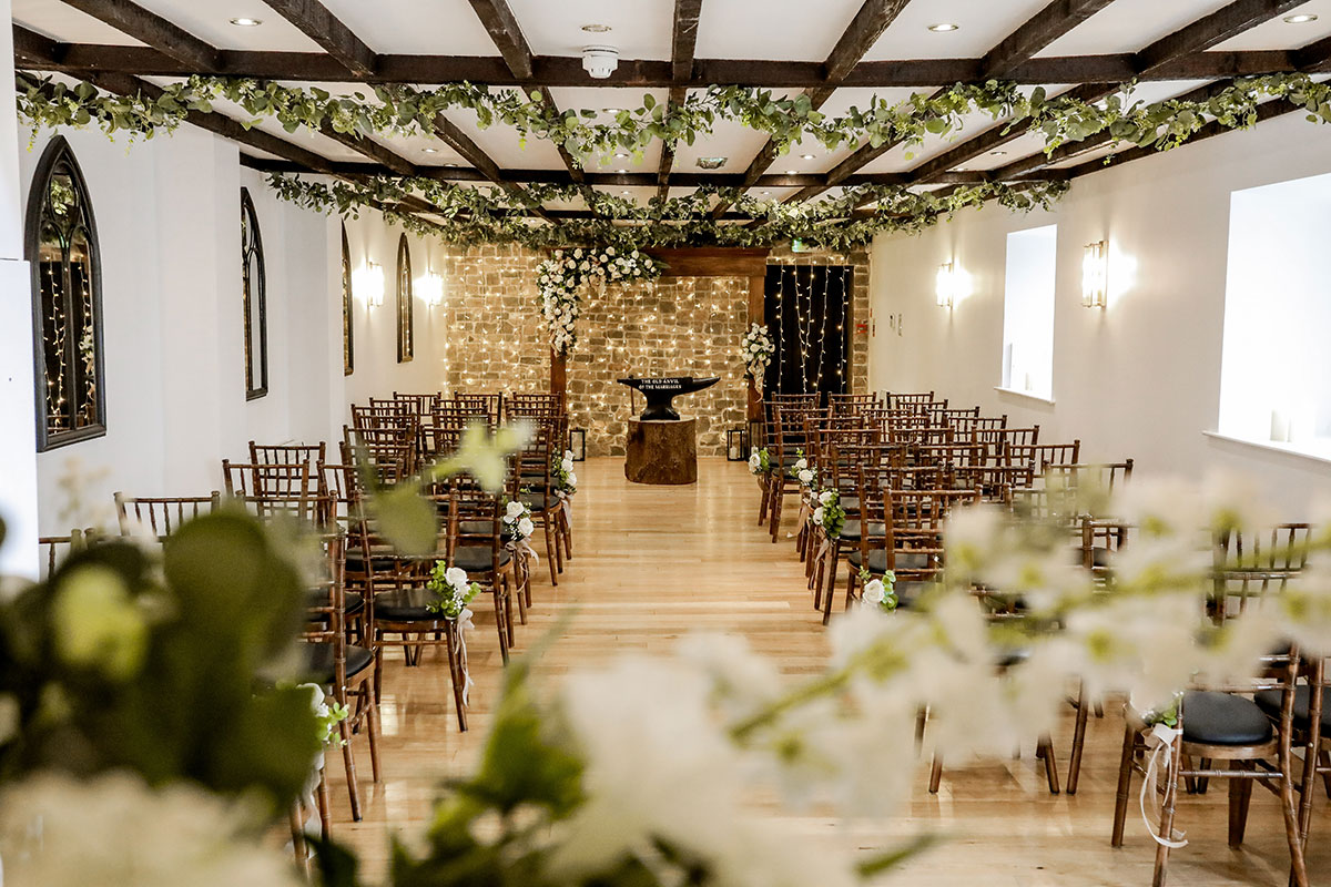 The Courtyard Marriage Room at Gretna Hall dressed for a wedding ceremony at Gretna Green
