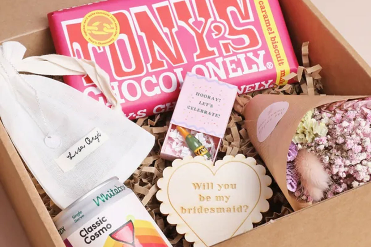 Bridesmaid proposal gift box with Tony’s Chocolonely bar, mini cocktail, dried flowers and personalised keepsake items