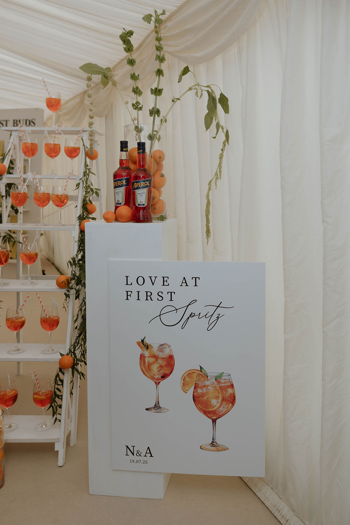 Aperol Spritz drinks station with personalised ‘Love at First Spritz’ sign at Ayrshire marquee wedding reception