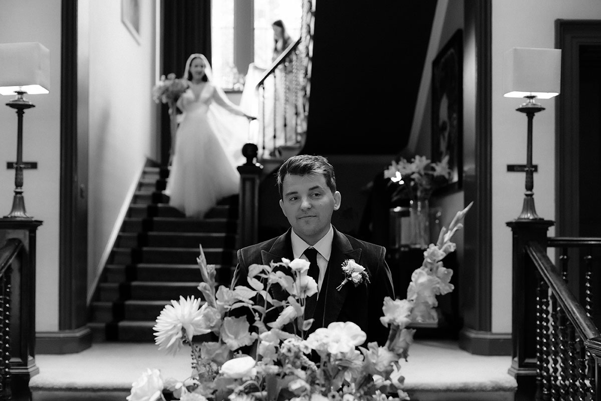 a bride and groom first look at Carlowrie Castle