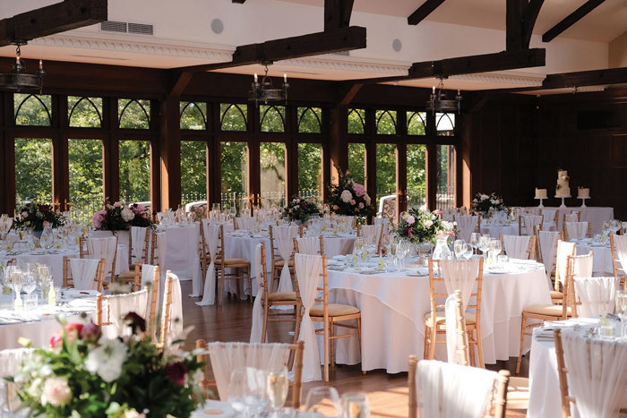 The Grand Roosevelt Ballroom at crossbasket castle set up for wedding breakfast