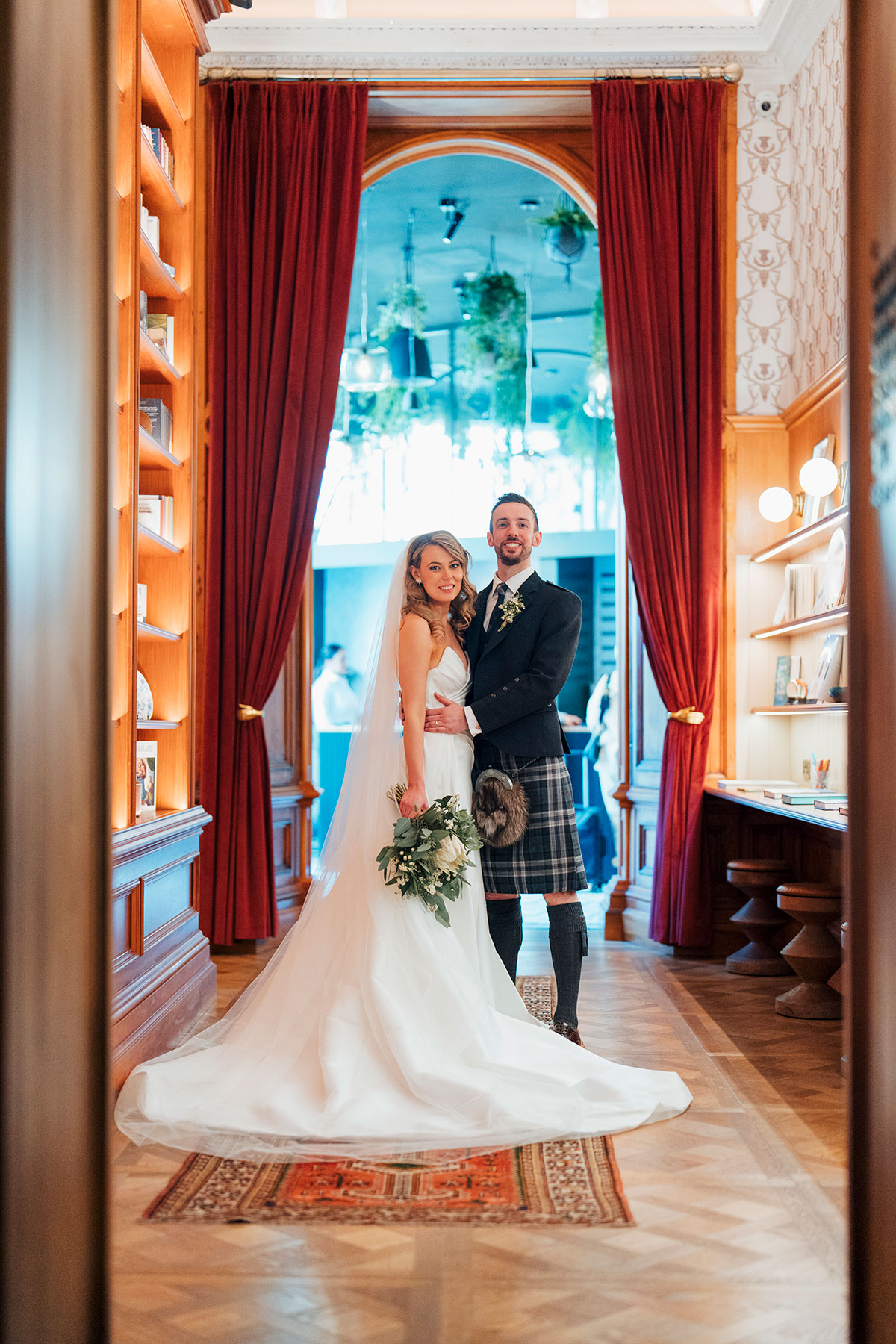 full length picture of bride and groom during their wedding at Virgin Hotels Edinburgh