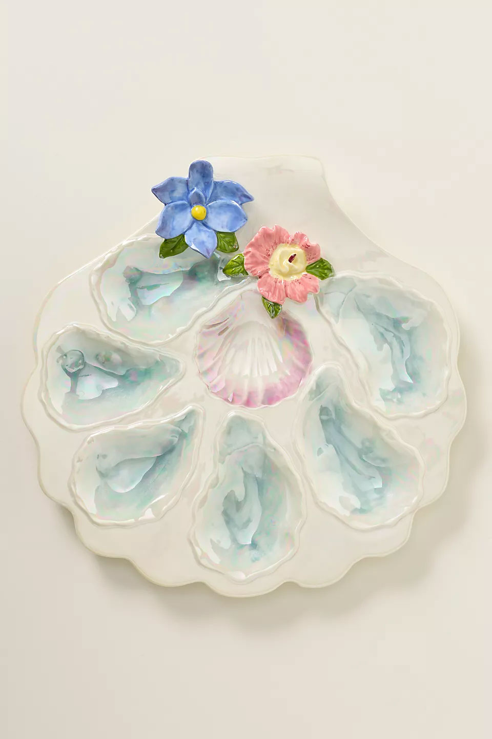 Decorative oyster serving platter with iridescent finish and hand-painted floral details, a unique wedding gift idea for hosting and dining