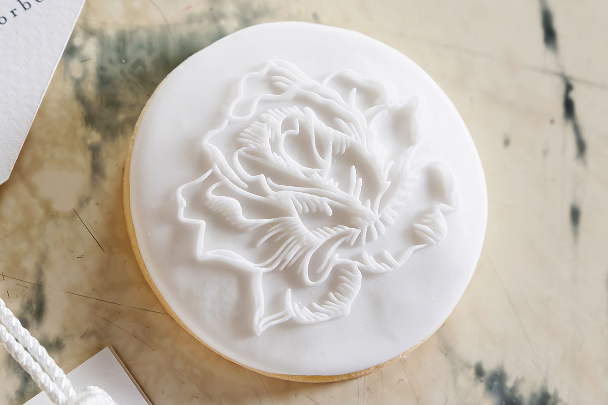 White iced biscuit wedding favour