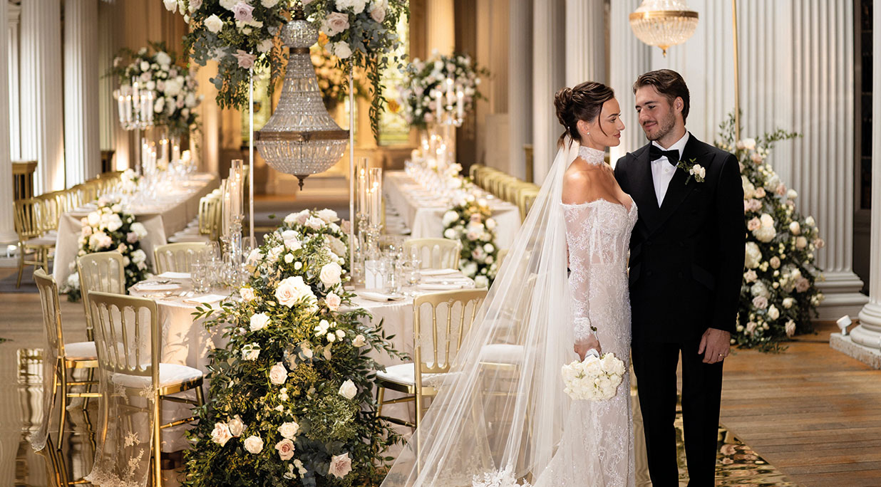 a bride and groom in the Upper Library of the Signet Library
