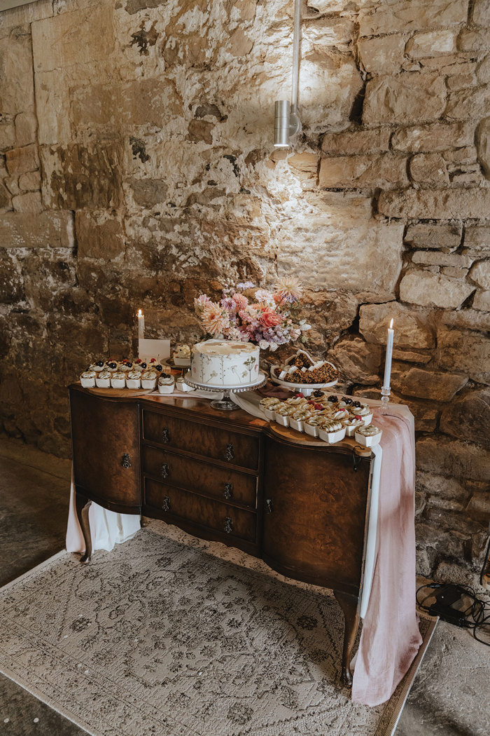 wedding cake set up on table for wedding at falside mill